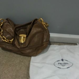 Brown calfskin Prada bag with gold chain strap